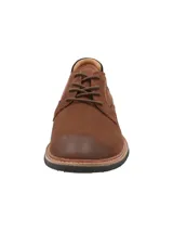 Zapato de cuero natural color chocolate con diseño de cordones, punta redonda y suela de EVA con tecnología Honey Foam para mayor amortiguación.