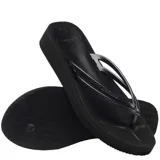 Sandalias tipo ojota Havaianas color negro, con diseño de plataforma y tiras finas con textura grabada.