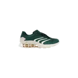 Championes Adidas Predator Megaride Kith color verde oscuro con detalles en blanco y suela con tecnología de amortiguación con tubos visibles.