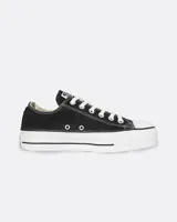 Championes Converse Chuck Taylor All Star Lift OX, modelo de lona color negro con plataforma blanca y suela de goma. Cuenta con cordones blancos, puntera de goma y ojalillos metálicos laterales para mayor ventilación.