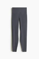 Leggings deportivos de tiro alto en color gris oscuro, confeccionados con tejido funcional SculptMove que realza la figura y ofrece sujeción, y tecnología DryMove para absorber el sudor.