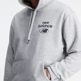 Canguro gris de algodón y poliéster con capucha, bolsillo tipo canguro y logo de New Balance estampado en el pecho.