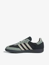 Zapatillas Adidas Samba OG, color negro con detalles en verde agua y beige.