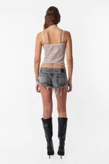 Top largo negro de microtul con foil, sin mangas y breteles regulables.