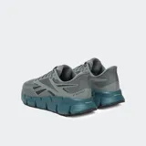 Championes Reebok EO-ZIG Dynamica, color gris con detalles en azul.