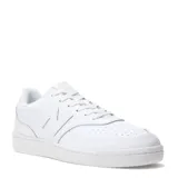 Championes New Balance modelo 080, color blanco, con logo "N" en los laterales y perforaciones en la puntera.