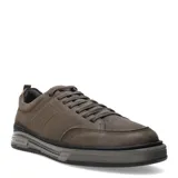 Championes urbanos Democrata modelo Dylan, color azul marino, confeccionados en cuero con detalles de textura perforada en los laterales y puntera. Presentan suela de goma en tono gris con diseño estriado y cierre mediante cordones al tono.