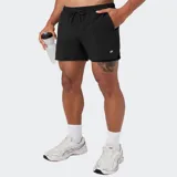 Short deportivo gris oscuro de Fabletics, modelo The One, con cintura elástica con cordón ajustable, bolsillos con cierre y diseño aerodinámico de secado rápido.