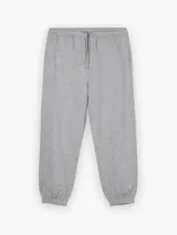 Pantalón de jogging gris melange con cintura elástica ajustable con cordón, bolsillos frontales y puños elastizados.