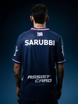 Camiseta de fútbol Umbro del Club Nacional de Football, modelo Away 2. Diseño azul con detalles en blanco y rojo en cuello y mangas. Incluye logo de Umbro, escudo del club y sponsor Antel en el frente.