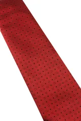 Corbata verde oscuro con estampado floral y pañuelo de bolsillo a juego.
