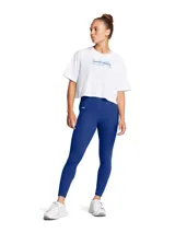Calza deportiva Under Armour de tiro alto, color azul, con cintura ancha y bolsillo lateral. Confeccionada en tejido de doble punto elástico con tecnología de absorción de sudor.