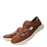 Sandalias tipo cerradas de cuero color marrón coñac, con diseño troquelado en la parte superior, cierre de velcro lateral y suela de goma blanca.