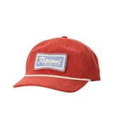 Gorra de pana color rojo, con cordón decorativo blanco en la base de la visera y parche bordado frontal con el logo de Rip Curl Surf Shop.