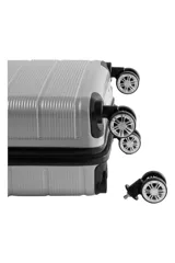 Valija carry on de diseño rígido y color gris, con ruedas dobles spinner 360 grados desmontables, candado incorporado y sistema de sujeción interno.