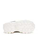 Championes Cat modelo Intruder Lite Vent, de diseño robusto con capellada en combinación de cuero sintético y malla técnica en color negro. Presenta una suela de plataforma dentada en color blanco, con logo de la marca en el lateral y tiradores en lengüeta y talón.