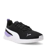 Championes deportivos Puma modelo Anzarun Lite, color negro con detalles en blanco y lila. Presentan una capellada de malla transpirable, cierre con cordones y suela de goma blanca con refuerzo lila en el talón.