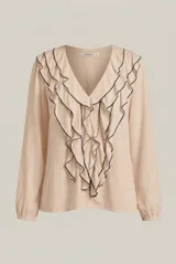 Blusa celeste de manga larga con escote en V y volados en cascada ribeteados en color oscuro. Cuenta con puños elásticos.