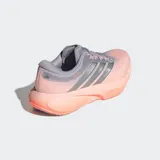 Championes de running Adidas Supernova Rise, con tecnología de amortiguación Dreamstrike+ en la mediasuela para una pisada suave y estable. Presentan un diseño en tonos naranja y gris, con exterior de tela y sintético, y suela de caucho.