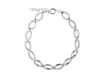 Pulsera de plata italiana 925 con eslabones ovalados, algunos de ellos decorados con circonias blancas.