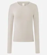 Blusa de manga larga con cuello redondo, confeccionada en algodón con un toque de elastano. Presenta un diseño básico, liso y ajustado al cuerpo.
