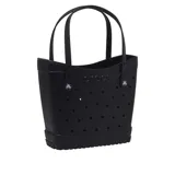 Bolso tipo tote Crocs Classic Medium Tote, color tostado, confeccionado en material Croslite moldeado y perforado, con diseño inspirado en los clásicos zuecos de la marca, doble asa de hombro y el logotipo en relieve en la parte frontal.