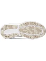 Championes de running Under Armour Charged Rogue 5, color beige con suela blanca. Presentan parte superior de malla técnica transpirable, entresuela Charged Cushioning para mayor amortiguación y suela exterior de goma resistente.