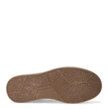 Championes urbanos de plataforma color beige, con diseño de paneles superpuestos y cierre mediante cordones al tono.