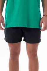 Short de baño negro con logo estilo vintage de la marca Vernal Club en colores neón.