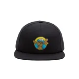 Gorra negra de Vans con parche bordado del Monstruo Comegalletas de Sesame Street comiendo galletas, sobre un círculo amarillo.