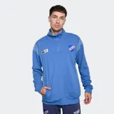 Buzo azul con medio cierre, cuello alto y escudo del Club Nacional de Football bordado en el pecho.