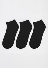 Pack de tres pares de medias de tobillo color negro, confeccionadas en algodón reciclado, poliéster y elastano.
