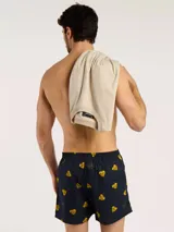 Bóxer de algodón azul marino con estampado de corazones amarillos, con cintura elastizada.