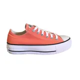 Championes Converse Chuck Taylor All Star Lift color naranja con plataforma blanca y cordones blancos.