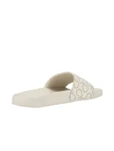 Ojotas tipo slide Calvin Klein con capellada ancha estampada con el monograma de la marca. Poseen una plantilla anatómica contorneada para mayor confort y suela de EVA.