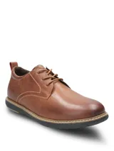 Zapato casual Hush Puppies modelo Bolo, confeccionado en cuero color marrón con costuras a la vista. Presenta cierre mediante cordones, interior forrado y suela de EVA flexible con diseño ergonómico.