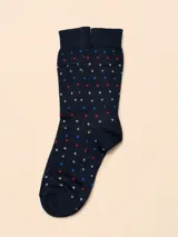 Medias de algodón en color azul marino con estampado de pequeños puntos en tonos rojo, blanco y azul.