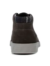 Botas de estilo casual Hush Puppies, confeccionadas en cuero gamuzado color gris oscuro. Presentan cierre de cordones, suela de poliuretano con tecnología Spinal para mayor amortiguación y estabilidad, y sistema de plantilla Dual Fit.