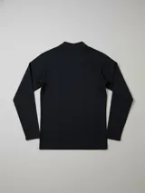 Rashguard de manga larga con protección UV, color negro con logo Rusty estampado en blanco en el pecho.