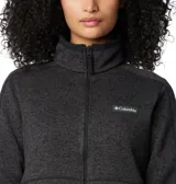 Campera polar Columbia con cierre frontal completo, confeccionada en tejido tipo jersey de textura jaspeada. Presenta cuello alto, bolsillos laterales con cierre y ribetes elásticos en puños y cuello.