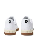 Championes de fútbol sala Puma modelo Tifosi Calcio Ls, color blanco con la franja característica de la marca en negro y suela de goma color caramelo.