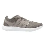 Championes New Balance WL415GM de dama, color gris con detalles en blanco, ideales para running.