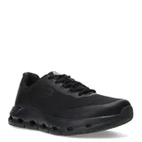 Championes deportivos unisex de diseño moderno, color negro, con capellada de malla transpirable y mediasuela de gran volumen con orificios laterales para mayor amortiguación.
