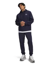 Pantalón de jogging Under Armour azul marino, de corte deportivo, con bolsillos laterales con cierre y puños elásticos en los tobillos.