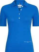 Chomba azul de Tommy Hilfiger, corte slim fit, con cuello polo, tapeta de botones y logo bordado en el pecho.