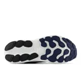 Championes New Balance X EVOZ v3 para hombre, color azul marino con detalles en blanco y amarillo.