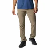 Pantalon de trekking Columbia color arena, con tecnologia de proteccion solar Omni-Shade y repelencia a la humedad Omni-Shield. Diseno de corte recto con tejido elastizado en cuatro direcciones.
