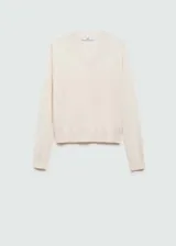 Buzo de punto fino con cuello en pico y manga larga, con terminaciones en canalé.