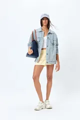 Minifalda color amarillo pastel con cintura elastizada y doble volado.