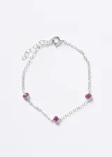 Pulsera de cadena forcé en plata 925 con tres puntos de luz ovalados engastados con zirconias color fucsia.